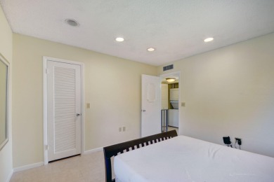 Beautifully maintained 3-bedroom, 3-bath corner unit on the golf on Fountains Golf and Country Club in Florida - for sale on GolfHomes.com, golf home, golf lot