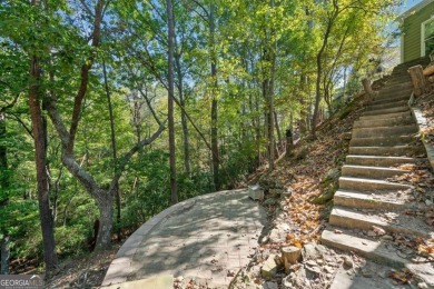 Lakeview Cottage Retreat on Wooded Lot Overlooking a Flowing on The Highlands Course at Lake Arrowhead in Georgia - for sale on GolfHomes.com, golf home, golf lot