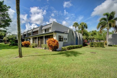 Beautifully maintained 3-bedroom, 3-bath corner unit on the golf on Fountains Golf and Country Club in Florida - for sale on GolfHomes.com, golf home, golf lot