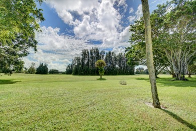 Beautifully maintained 3-bedroom, 3-bath corner unit on the golf on Fountains Golf and Country Club in Florida - for sale on GolfHomes.com, golf home, golf lot