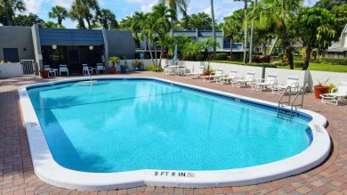 Beautifully maintained 3-bedroom, 3-bath corner unit on the golf on Fountains Golf and Country Club in Florida - for sale on GolfHomes.com, golf home, golf lot