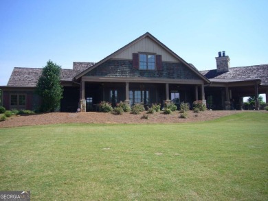 Lakeview Cottage Retreat on Wooded Lot Overlooking a Flowing on The Highlands Course at Lake Arrowhead in Georgia - for sale on GolfHomes.com, golf home, golf lot