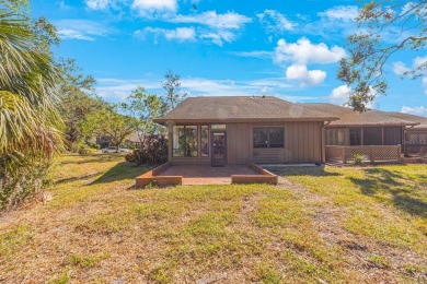 Beautifully UPDATED TURNKEY end unit villa with lots of natural on Palm Aire Country Club of Sarasota in Florida - for sale on GolfHomes.com, golf home, golf lot