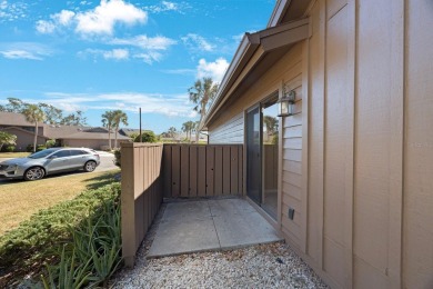 Beautifully UPDATED TURNKEY end unit villa with lots of natural on Palm Aire Country Club of Sarasota in Florida - for sale on GolfHomes.com, golf home, golf lot