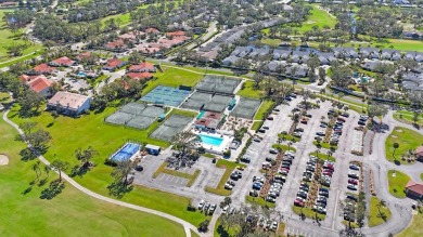 Beautifully UPDATED TURNKEY end unit villa with lots of natural on Palm Aire Country Club of Sarasota in Florida - for sale on GolfHomes.com, golf home, golf lot