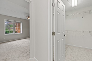 Experience resort-style living in this main floor 2-bed, 2-bath on Old Orchard Country Club in Illinois - for sale on GolfHomes.com, golf home, golf lot