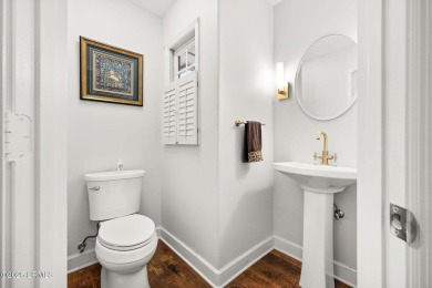 A charming and meticulously maintained home in the highly on Country Club of Hilton Head in South Carolina - for sale on GolfHomes.com, golf home, golf lot