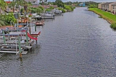 Incredible Waterfront Opportunity in Gulf Harbors Woodlands - on Gulf Harbors Golf Course in Florida - for sale on GolfHomes.com, golf home, golf lot