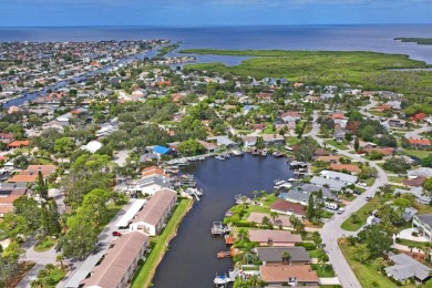 Incredible Waterfront Opportunity in Gulf Harbors Woodlands - on Gulf Harbors Golf Course in Florida - for sale on GolfHomes.com, golf home, golf lot