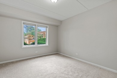 Experience resort-style living in this main floor 2-bed, 2-bath on Old Orchard Country Club in Illinois - for sale on GolfHomes.com, golf home, golf lot
