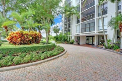 Enjoy tranquil golf course vistas from all angles and the on Boca West Golf and Country Club in Florida - for sale on GolfHomes.com, golf home, golf lot