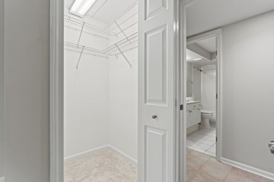 Experience resort-style living in this main floor 2-bed, 2-bath on Old Orchard Country Club in Illinois - for sale on GolfHomes.com, golf home, golf lot