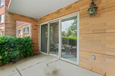 Experience resort-style living in this main floor 2-bed, 2-bath on Old Orchard Country Club in Illinois - for sale on GolfHomes.com, golf home, golf lot
