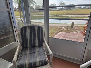 You don't want to miss this fully furnished 2/2 home in Hidden on Lake Henry Golf Club in Florida - for sale on GolfHomes.com, golf home, golf lot