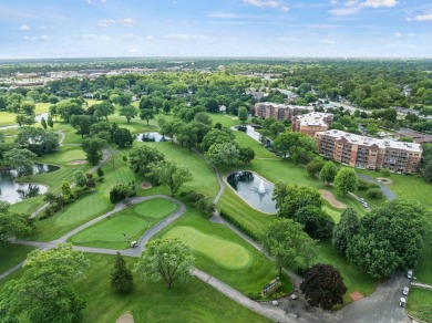Experience resort-style living in this main floor 2-bed, 2-bath on Old Orchard Country Club in Illinois - for sale on GolfHomes.com, golf home, golf lot