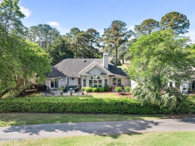 A charming and meticulously maintained home in the highly on Country Club of Hilton Head in South Carolina - for sale on GolfHomes.com, golf home, golf lot