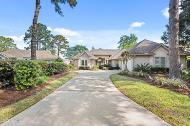 A charming and meticulously maintained home in the highly on Country Club of Hilton Head in South Carolina - for sale on GolfHomes.com, golf home, golf lot