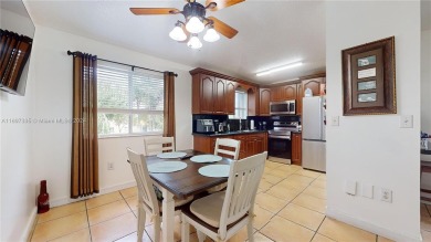 This beautifully updated condo in Bonita Golf View Villas is on Country Club of Miami in Florida - for sale on GolfHomes.com, golf home, golf lot