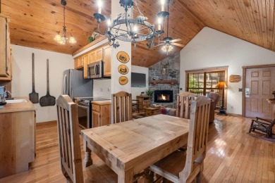 Immerse yourself in the rustic charm of this picturesque on Ledgestone Country Club and Golf Course in Missouri - for sale on GolfHomes.com, golf home, golf lot