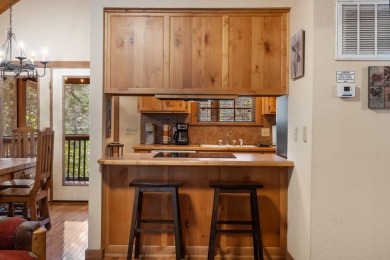 Immerse yourself in the rustic charm of this picturesque on Ledgestone Country Club and Golf Course in Missouri - for sale on GolfHomes.com, golf home, golf lot