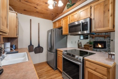 Immerse yourself in the rustic charm of this picturesque on Ledgestone Country Club and Golf Course in Missouri - for sale on GolfHomes.com, golf home, golf lot