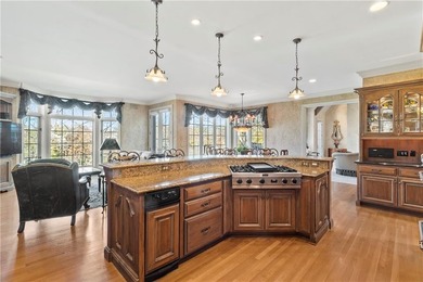 Stunning European-inspired home on Loch Lloyd's iconic 18th hole on Loch Lloyd Country Club in Missouri - for sale on GolfHomes.com, golf home, golf lot