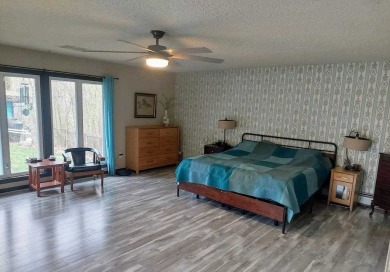 This unique 3900 sq foot resort- like residence is located on a on The Chief Golf Course in Michigan - for sale on GolfHomes.com, golf home, golf lot