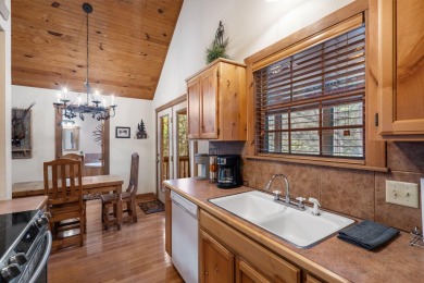 Immerse yourself in the rustic charm of this picturesque on Ledgestone Country Club and Golf Course in Missouri - for sale on GolfHomes.com, golf home, golf lot