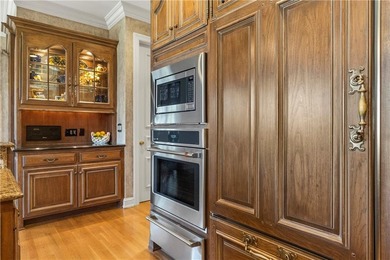 Stunning European-inspired home on Loch Lloyd's iconic 18th hole on Loch Lloyd Country Club in Missouri - for sale on GolfHomes.com, golf home, golf lot