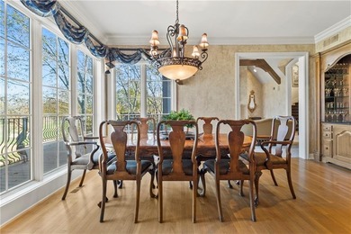 Stunning European-inspired home on Loch Lloyd's iconic 18th hole on Loch Lloyd Country Club in Missouri - for sale on GolfHomes.com, golf home, golf lot