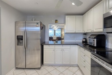 Golf Course Views, Minutes to the Beach - 3-Bedroom Corner Condo on Deer Creek Golf Club in Florida - for sale on GolfHomes.com, golf home, golf lot