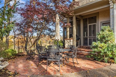 Stunning European-inspired home on Loch Lloyd's iconic 18th hole on Loch Lloyd Country Club in Missouri - for sale on GolfHomes.com, golf home, golf lot