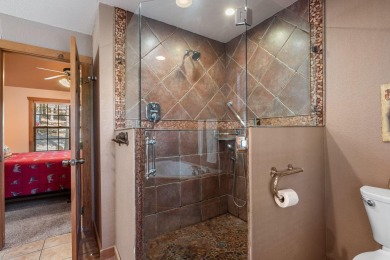 Immerse yourself in the rustic charm of this picturesque on Ledgestone Country Club and Golf Course in Missouri - for sale on GolfHomes.com, golf home, golf lot