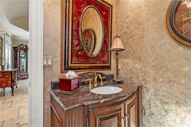 Stunning European-inspired home on Loch Lloyd's iconic 18th hole on Loch Lloyd Country Club in Missouri - for sale on GolfHomes.com, golf home, golf lot