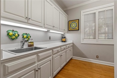 Stunning European-inspired home on Loch Lloyd's iconic 18th hole on Loch Lloyd Country Club in Missouri - for sale on GolfHomes.com, golf home, golf lot