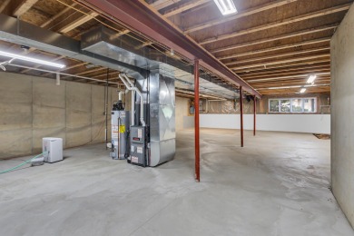 COMPLETELY UPDATED SUMMIT TOWNSHIP CONDO FEATURING MAIN FLOOR on Country Club of Jackson in Michigan - for sale on GolfHomes.com, golf home, golf lot