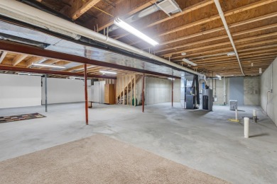 COMPLETELY UPDATED SUMMIT TOWNSHIP CONDO FEATURING MAIN FLOOR on Country Club of Jackson in Michigan - for sale on GolfHomes.com, golf home, golf lot