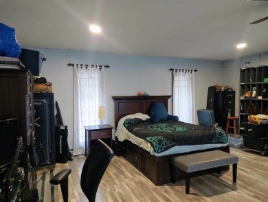 This unique 3900 sq foot resort- like residence is located on a on The Chief Golf Course in Michigan - for sale on GolfHomes.com, golf home, golf lot