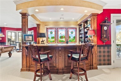 Stunning European-inspired home on Loch Lloyd's iconic 18th hole on Loch Lloyd Country Club in Missouri - for sale on GolfHomes.com, golf home, golf lot
