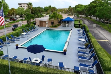 Golf Course Views, Minutes to the Beach - 3-Bedroom Corner Condo on Deer Creek Golf Club in Florida - for sale on GolfHomes.com, golf home, golf lot
