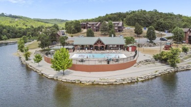 Immerse yourself in the rustic charm of this picturesque on Ledgestone Country Club and Golf Course in Missouri - for sale on GolfHomes.com, golf home, golf lot