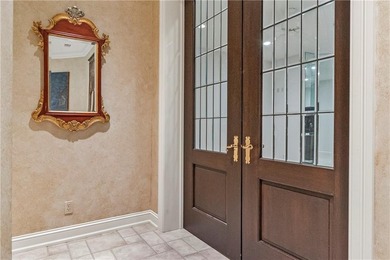 Stunning European-inspired home on Loch Lloyd's iconic 18th hole on Loch Lloyd Country Club in Missouri - for sale on GolfHomes.com, golf home, golf lot