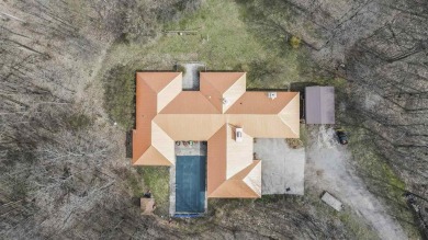 This unique 3900 sq foot resort- like residence is located on a on The Chief Golf Course in Michigan - for sale on GolfHomes.com, golf home, golf lot
