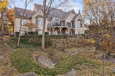 Stunning European-inspired home on Loch Lloyd's iconic 18th hole on Loch Lloyd Country Club in Missouri - for sale on GolfHomes.com, golf home, golf lot