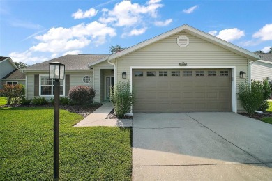 Prepared to be WOWED by this beautifully maintained golf course on Plantation Golf Club in Florida - for sale on GolfHomes.com, golf home, golf lot