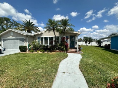 Lot Rent $1075 monthly     This beautiful 2-bedroom, 2 bathroom on Del Tura Golf and Country Club in Florida - for sale on GolfHomes.com, golf home, golf lot