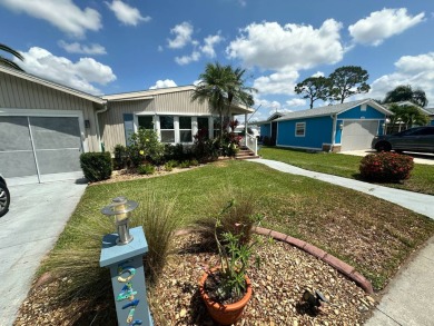 Lot Rent $1075 monthly     This beautiful 2-bedroom, 2 bathroom on Del Tura Golf and Country Club in Florida - for sale on GolfHomes.com, golf home, golf lot