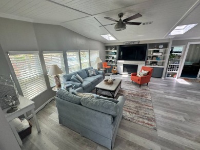 Lot Rent $1075 monthly     This beautiful 2-bedroom, 2 bathroom on Del Tura Golf and Country Club in Florida - for sale on GolfHomes.com, golf home, golf lot