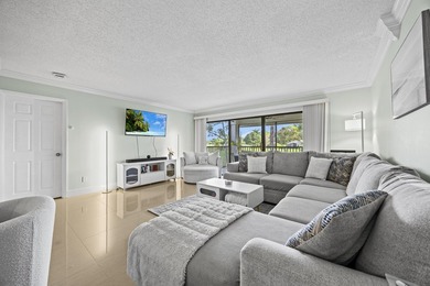 Welcome to 12926 Briarlake Dr #201 - a beautifully updated on Old Marsh Golf Club in Florida - for sale on GolfHomes.com, golf home, golf lot