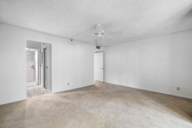 Welcome to this beautifully maintained first-floor corner condo on The Country Club At Boca Raton in Florida - for sale on GolfHomes.com, golf home, golf lot